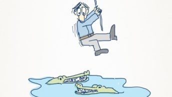 An illustration of a UX Designer swinging on a vine over a lake of crocodiles