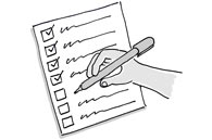 A hand filling out a form full of checkboxes