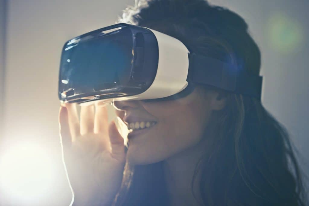 Photo of a woman wearing a VR headset