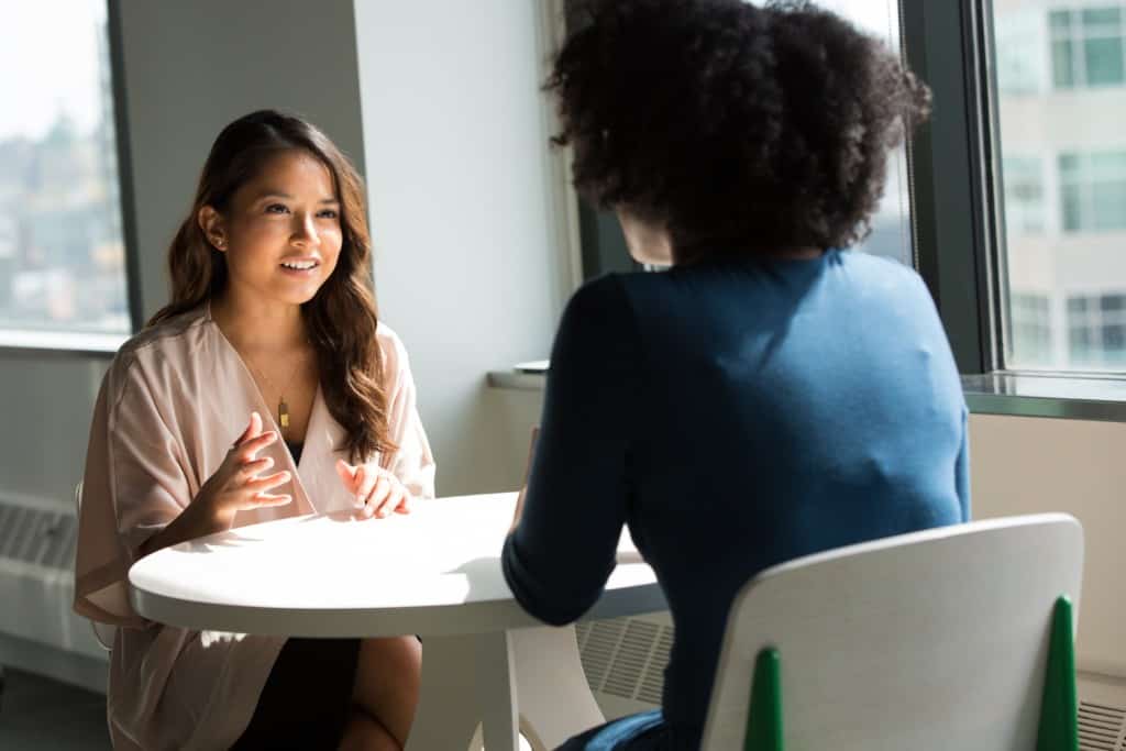 Two people talking